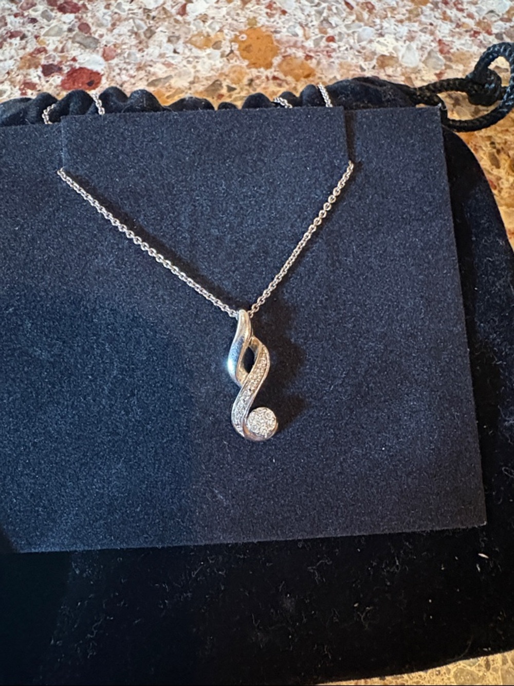 1/15 CT. T.W. Composite Diamond Flame Pendant in Sterling Silver